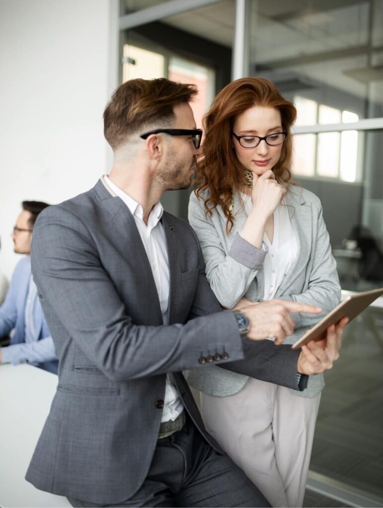 Group Of Lawyers Discussing Contract Together In O 78V4KJD 771x1024